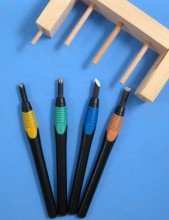 4 piece wood carving set.  Features plastic comfort grips. Includes straight, bevel, triangle and arc blade shapes. Great for detailed work with wood, plastics, rubber, etc.