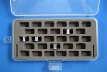 Holds 28 standard-size bobbins in a plastic case.