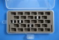 Holds 28 standard-size bobbins in a plastic case.
